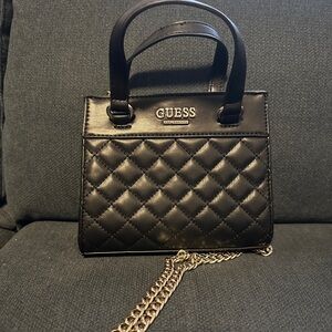 Guess small black and gold chain crossbody/tote.